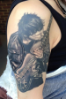 Matt Bellamy black and grey portrait tattoo